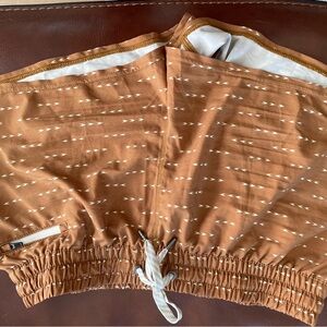 Vuori Brown Athletic Shorts with White Pattern